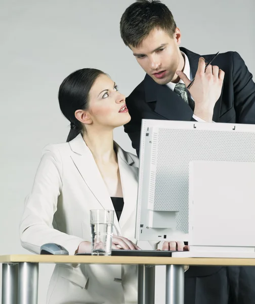 Businesspeople at computer — Stock Photo, Image