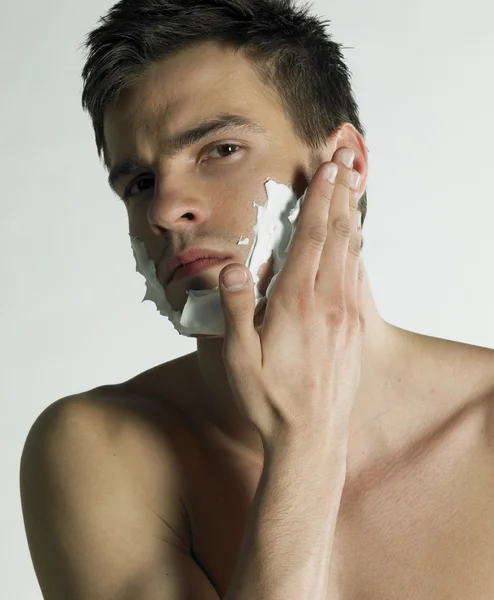 Ritratto dell'uomo con schiuma da barba — Foto Stock