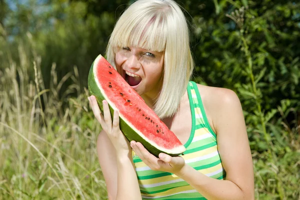 Portrait of woman with melon — Stock Photo, Image
