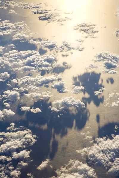 Clouds above ocean - view from plane — Stock Photo, Image