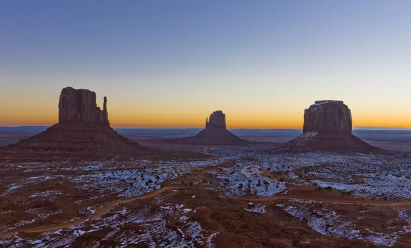 stock image The Mittens and Merrick Butte during sunrise, Monument Valley Na