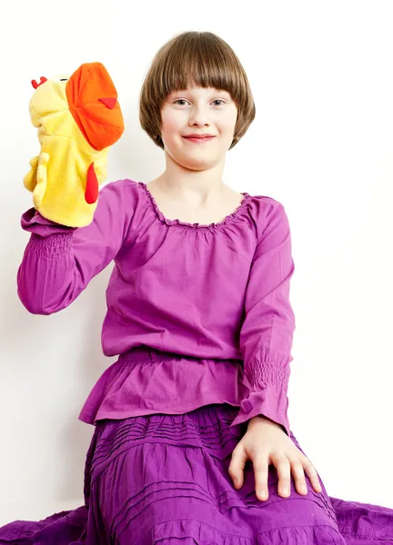 Girl with a glove puppet — Stock Photo, Image