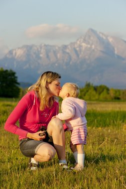 Mother with her baby girl, Krivan, Vysoke Tatry (High Tatras), S clipart