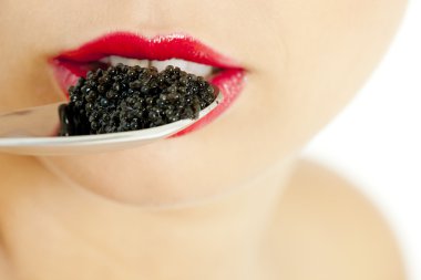 Detail of woman with black caviar clipart