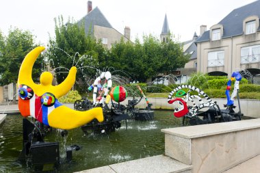 Modern fountain by Niki de Saint Phalle, Chateau-Chinon, Burgund clipart