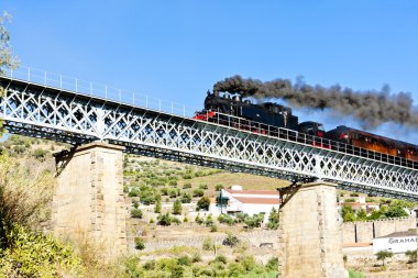 Steam train in Douro Valley, Portugal clipart