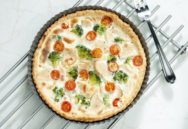 Cake with broccoli, cherry tomatoes and chicken meat clipart