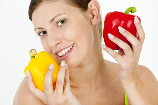Portrait of woman with peppers — Stock Photo, Image