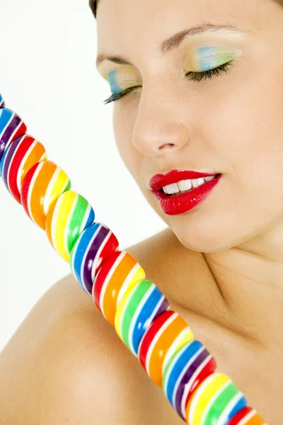 Portret kobiety z lollypop — Zdjęcie stockowe