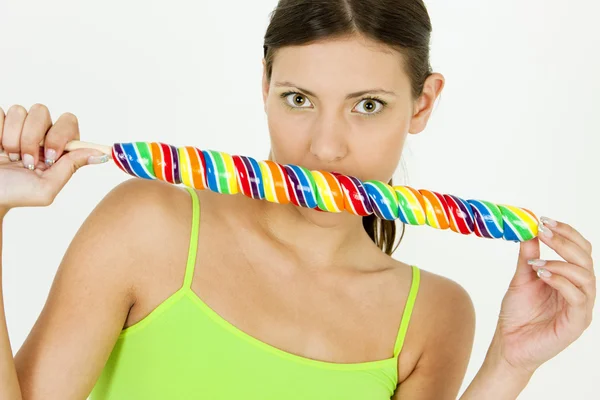 Portrait of woman with a lollypop — Stock Photo, Image