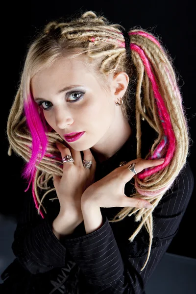Portrait of young woman with dreadlocks — Stock Photo, Image