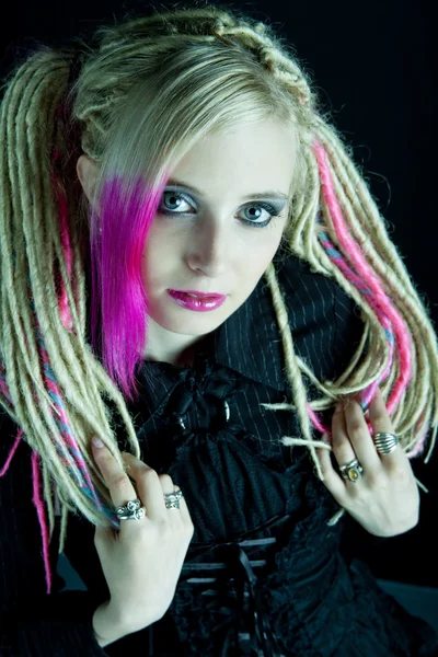 Portrait of young woman with dreadlocks — Stock Photo, Image