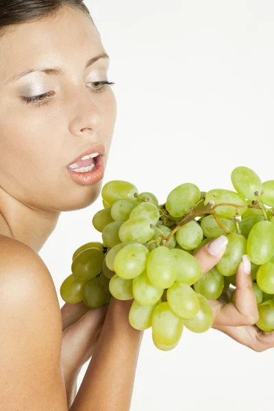 Portrait of young woman with grape — Stock Photo, Image
