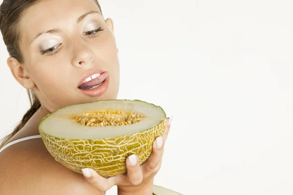Retrato de mujer con melón galia —  Fotos de Stock