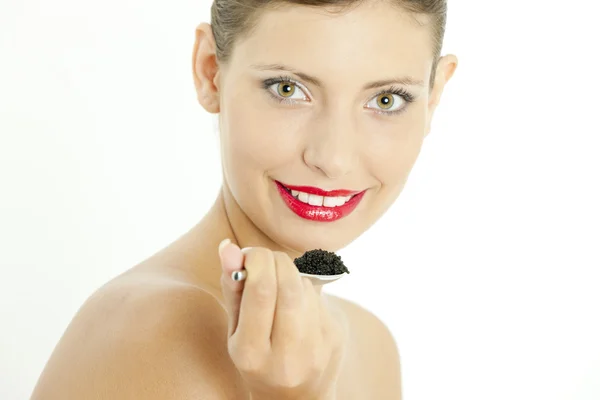 Retrato de mujer con caviar negro — Foto de Stock