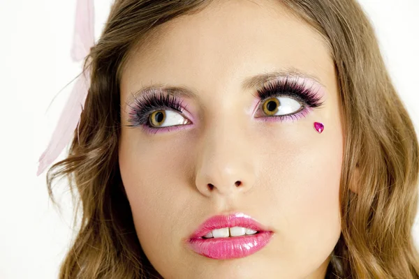 Portret van een jonge vrouw met make-up — Stockfoto