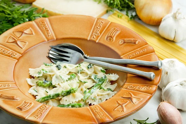 stock image Pasta farfalle with asparagus and rosemary