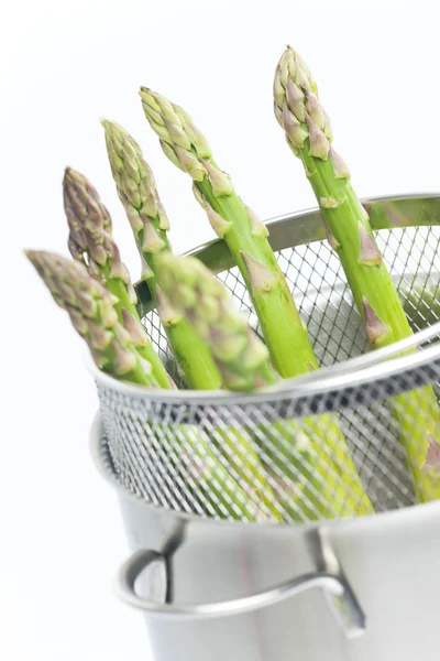 Green asparagus in pot — Stock Photo, Image