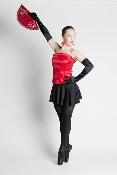Ballet dancer holding a fan — ストック写真