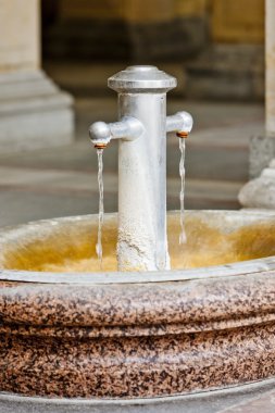 Boiling spring in Mlynska Colonnade, Karlovy Vary (Carlsbad), Cz clipart