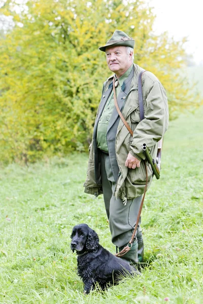 stock image Hunter with his dog hunting