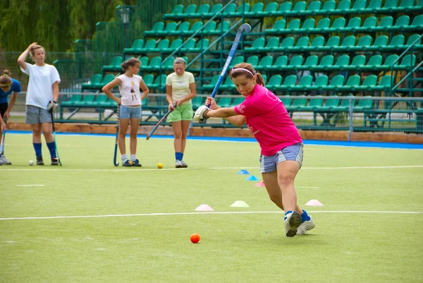 Bandy girl team training on a stadium — Stock Photo, Image