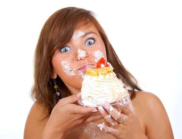 Menina comer bolo com as mãos — Fotografia de Stock