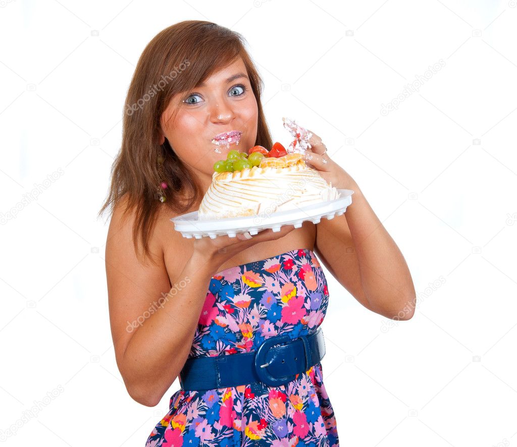 Girl eating cake with his hands