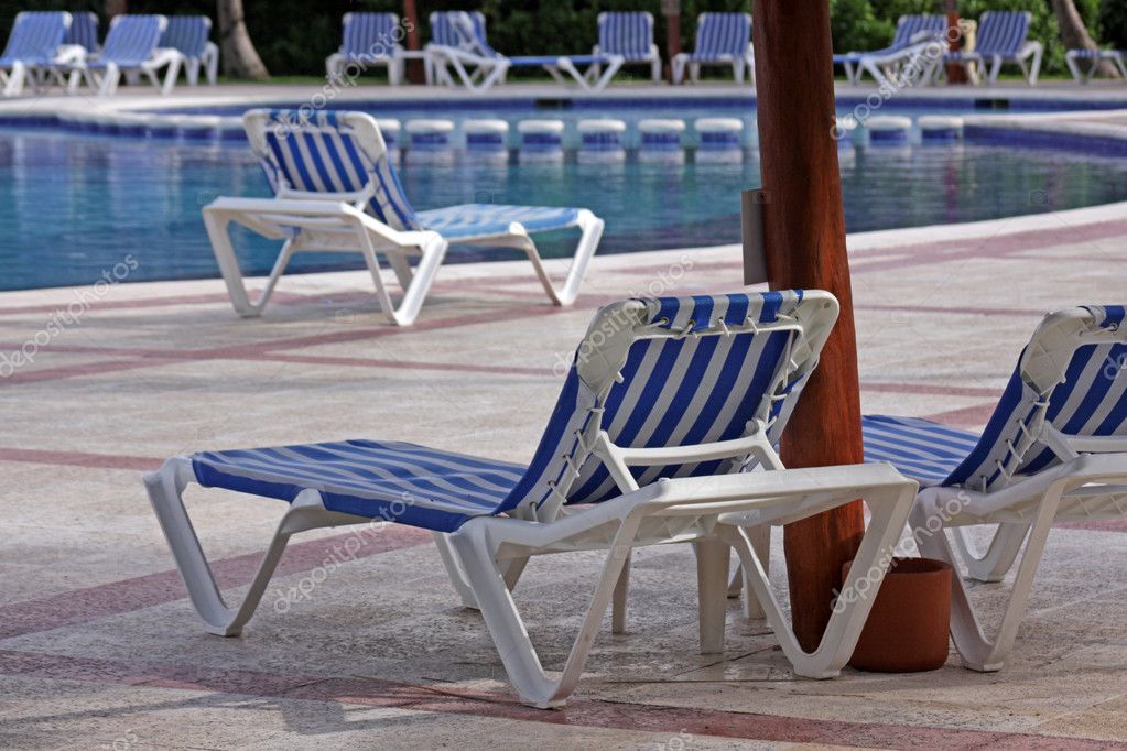 Resort Pool Lounge Chairs — Stock Photo © ca2hill 11858795
