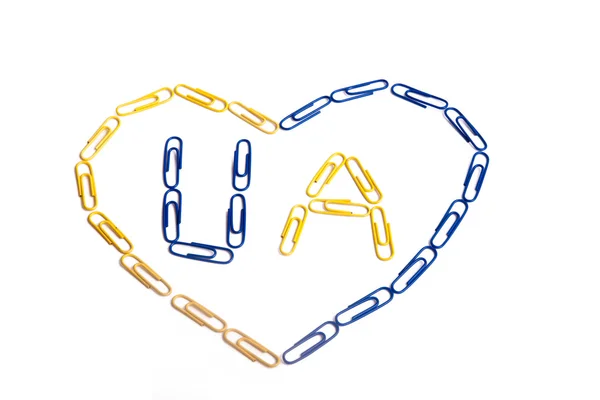 Heart made of Ukrainian flag colors paper clips — Stock Photo, Image