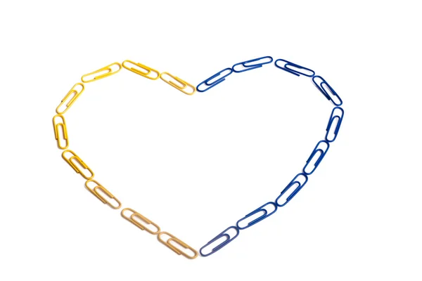 Heart made of Ukrainian flag colors paper clips — Stock Photo, Image