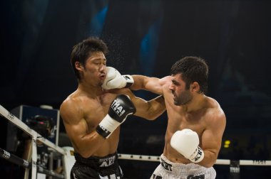 Japanes vs turkish thai boxer in bangkok clipart