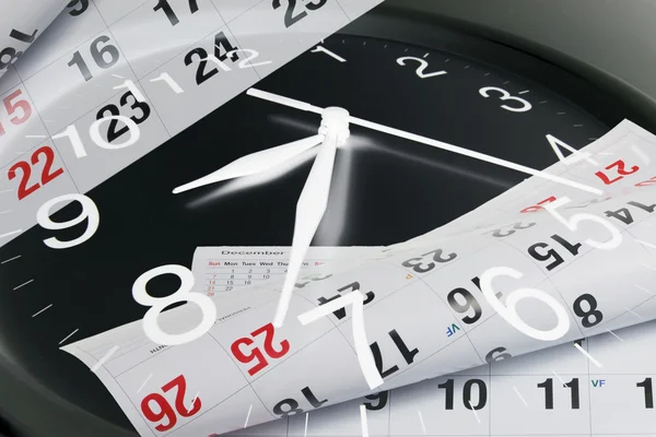 Календарь страниц и часов — стоковое фото