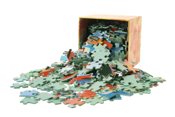 Jigsaw Puzzle Pieces and Box — Stock Photo, Image