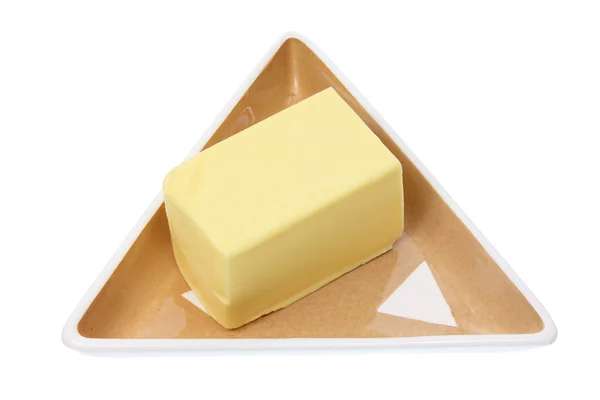 Mantequilla en la placa —  Fotos de Stock