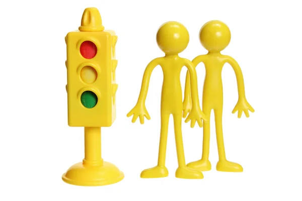 Figuras de borracha e semáforo — Fotografia de Stock