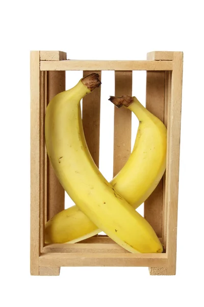 Bananen in houten kist — Stockfoto