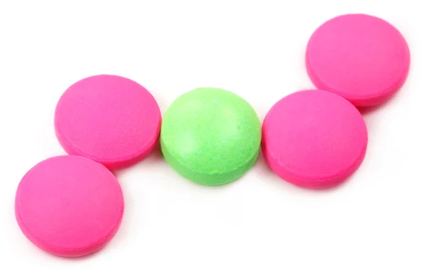 Pink and green tablets — Stock Photo, Image