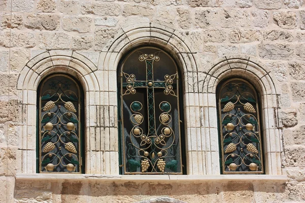 The decorative windows on the old will — Stock Photo, Image