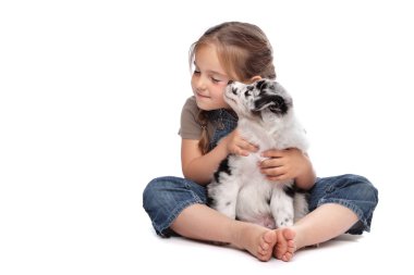 Little girl and a puppy clipart