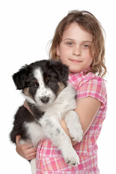 Kız ve kenar kömür ocağı köpek yavrusu — Stok fotoğraf