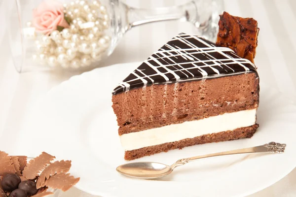 Chocolate cake on the white plate — Stock Photo, Image