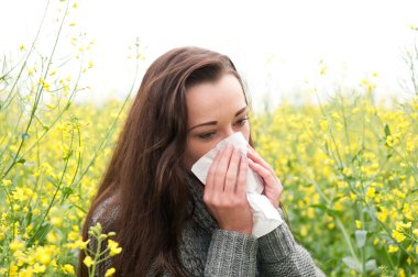 Young woman has hay fever clipart
