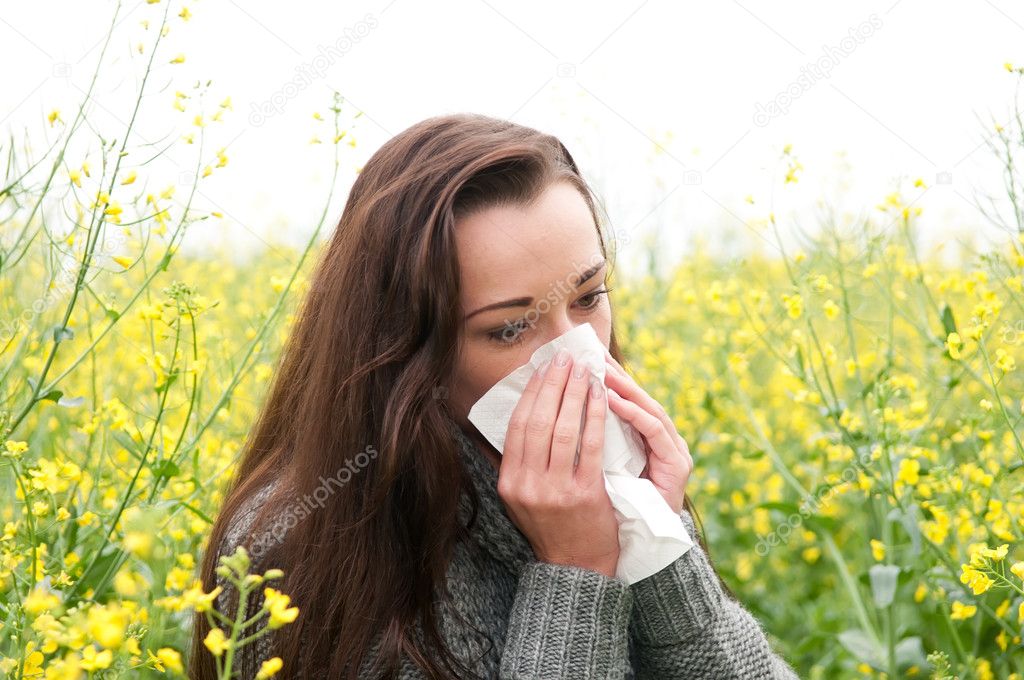 Young woman has hay fever