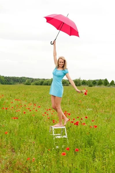 Woman with red umbrella — Stock Photo, Image