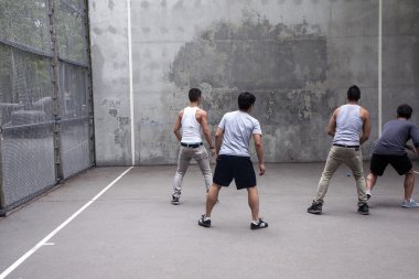 Group plays wall handball clipart