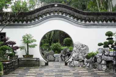 Circle entrance of Chinese garden in Hong Kong clipart