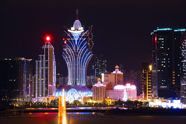 Macao cityscape with famous landmark of casino skyscraper and br