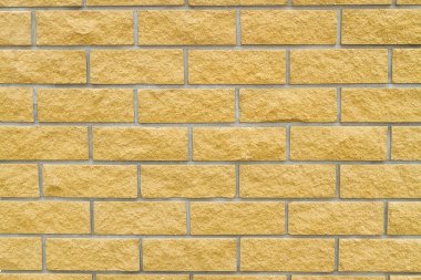 Brick wall of yellow stone clipart