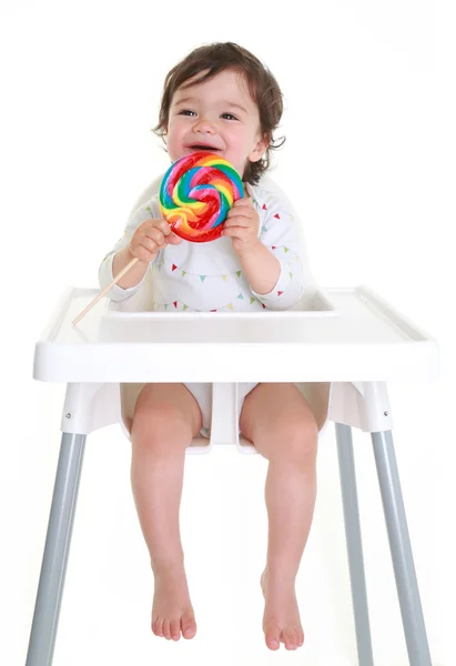 Bebê desfrutando pirulito — Fotografia de Stock